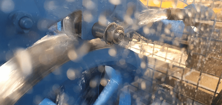 Fluid test rig for track rollers